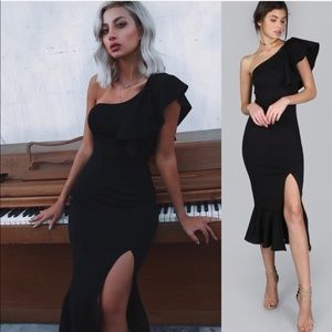 Mid length black mermaid dress with ruffled sleeve